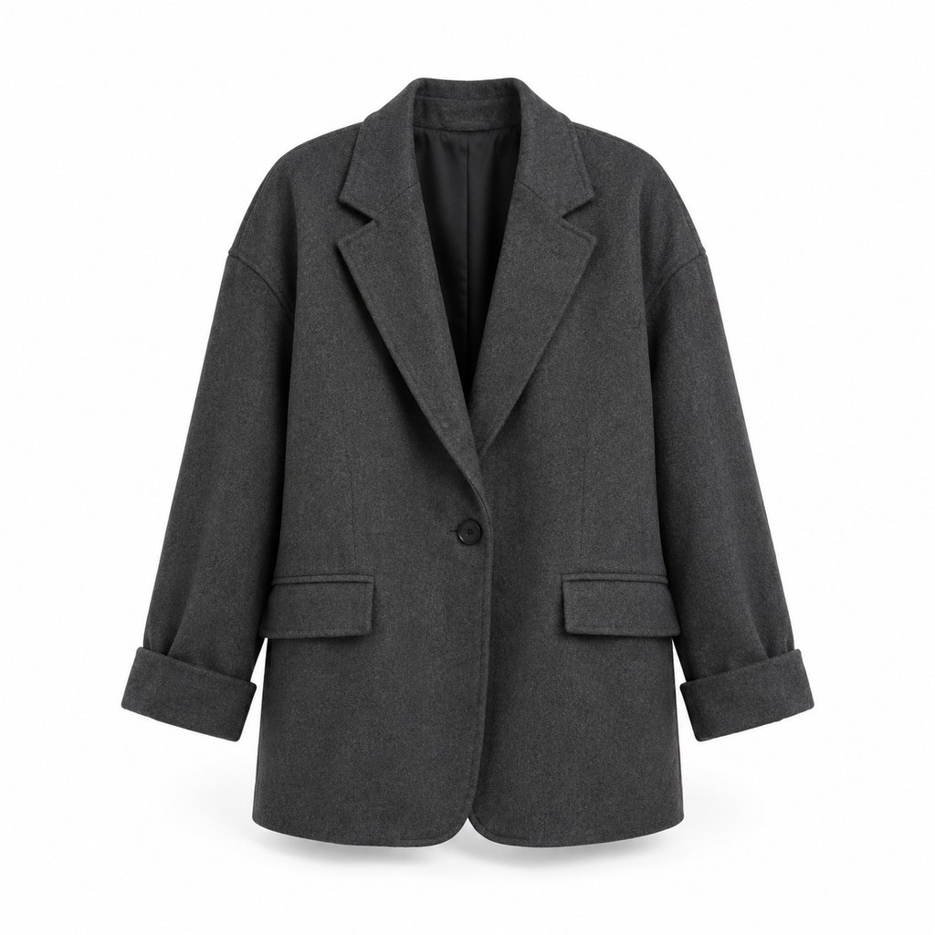 Oversized charcoal blazer worn by a model, front view